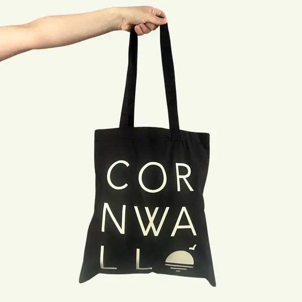 A durable cotton tote bag showcasing a Cornwall-themed design, ideal for shopping or casual outings.