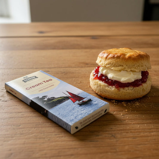 Cream tea flavoured milk chocolate bar with a scenic design on the packaging